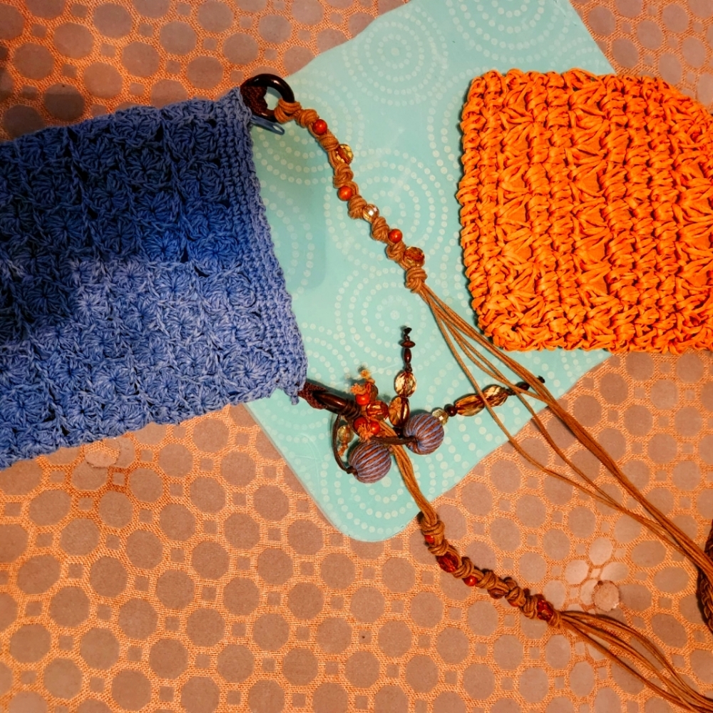 2 straw shoulder/crossbody straw purses.